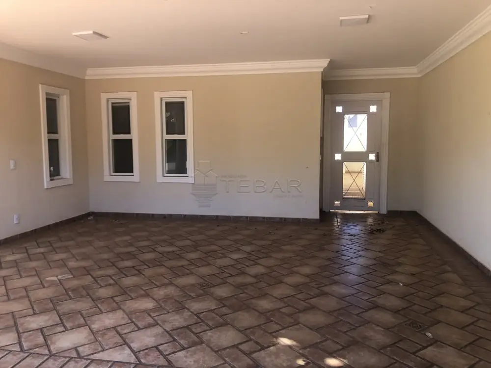 Interior de residência de alto padrão em condomínio fechado no Residencial Jardins — imóvel do catálogo da Imobiliária Tebar